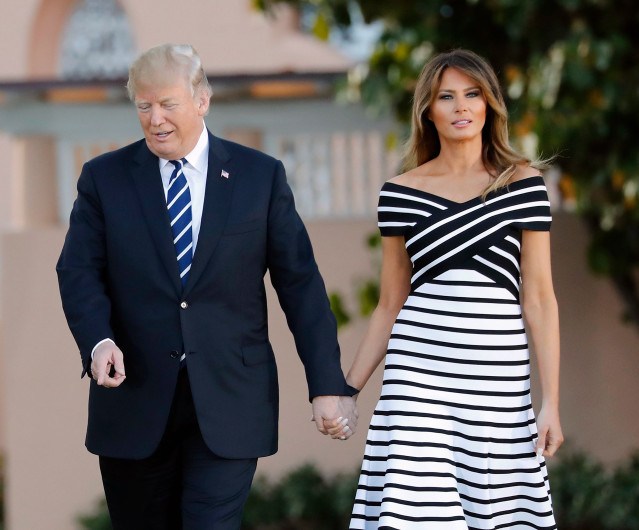 President Donald Trump, first lady Melania Trump, walks with Japanese Prime Minister Shinzo Abe and his wife Akie Abe as they walk to dinner at Trump's private Mar-a-Lago club, Tuesday, April 17, 2018, in Palm Beach, Fla. (AP Photo/Pablo Martinez Monsivais)