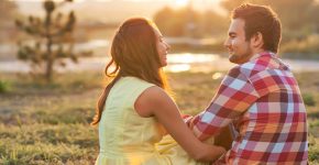 Young couple in love outdoor in the sunlight sunset.
